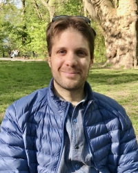 Photo of Quentin Buat sitting in a park