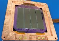 A DAMIC-M detector module with silicon CCDs. The module is enclosed in a high-purity copper frame for installation in the detector prototype.DAMIC-M Collaboration